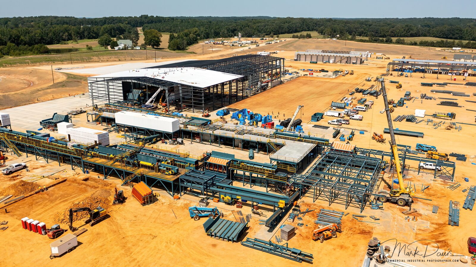 Aerial view of an industrial facility under construction